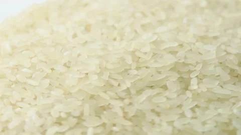 Macro white raw rice texture, food background, vegetarian healthy eating product Stock Footage 188300834