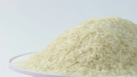 Macro white raw rice texture, food background, vegetarian healthy eating product Stock Footage 189980862