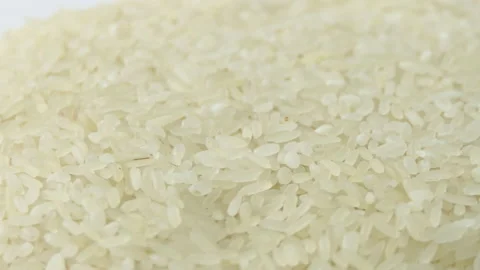 Macro white raw rice texture, food background, vegetarian healthy eating product Stock Footage 190561639