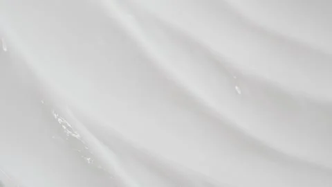 Macro white smooth eye, skin cream texture, closeup beauty facial cosmetics mask Stock Footage 274330232
