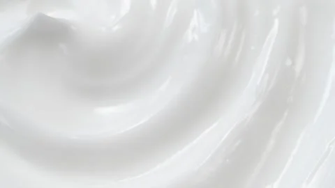 Macro white smooth eye, skin cream texture, closeup beauty facial cosmetics mask Stock Footage 319089960