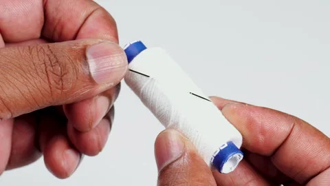 Macro White Thread And Needle In Hand Stock Footage 248703403