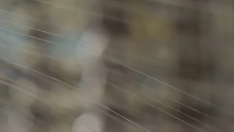 Macro White Threads from Spinning Machine at Sunlight Beam Stock Footage 72567431