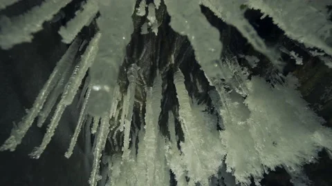 Macro winter sharp ice floes shiny icicles in mysterious cave Northern Baikal 4k Stock Footage 165664258