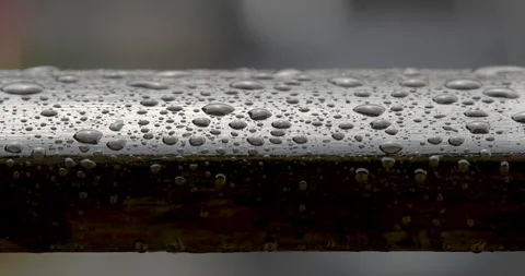 Macro - Wooden balcony in the rain Stock Footage 343521906