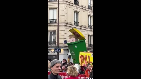 Macron image at the protest against pension reform in Paris, France Stockbeeldmateriaal 237096774