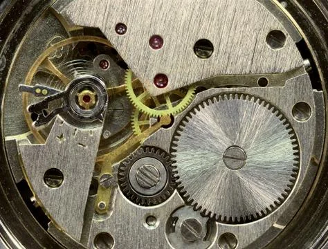 Macrophoto of old clockwork background Stock Photos