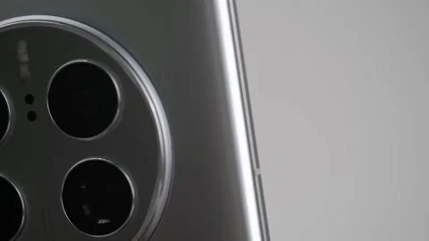 Macroplan rotation of camera lenses of the new Huawei Mate 50 Pro phone. details Stock Footage 239215982