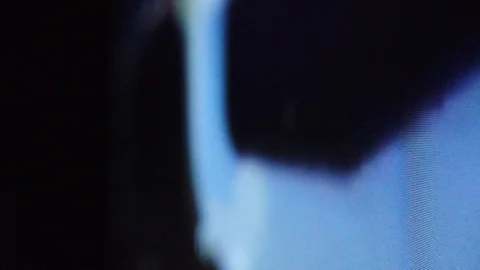 Macroscopic view of flickering computer code on LCD computer screen Vidéo 111660096