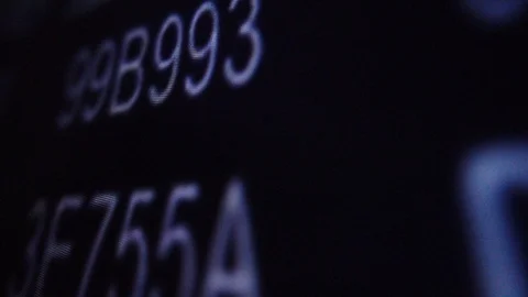 Macroscopic view of moving hexadecimal code matrix on LCD computer screen 스톡 동영상 111436979
