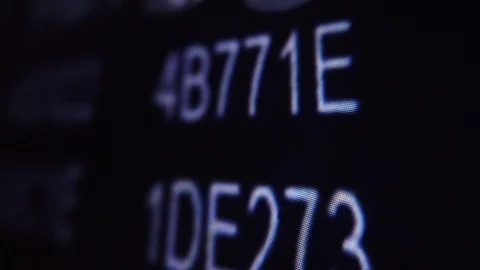 Macroscopic view of moving hexadecimal code matrix on LCD computer screen Stock Footage 111437268