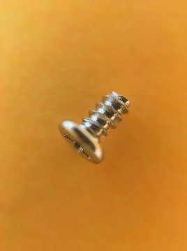 Macroscopic view of tiny screw Stock Photos