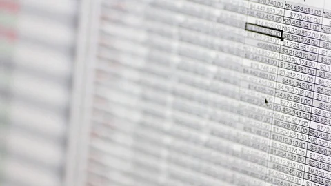 Macro/Shallow Depth of Field Scrolling through a Spreadsheet Stock Footage 89366724