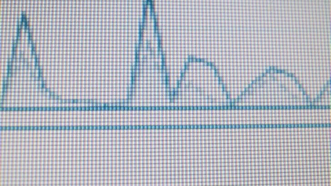 Macroshot of computer screen with blue data graph Stock Footage 126957875