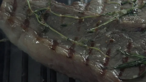 Macrovideo of a frying beef steak Stock Footage 92180030