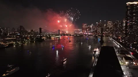 Macy's 4th of July fireworks celebration over East River New York Stock Footage 312931307