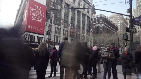 MACY'S - CROWDS CROSS SIXTH AVENUE NYC Video stock 88551064