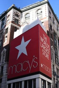 Macys Herald Square store with large red shopping bag display. Stock Photos