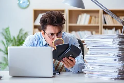 Mad auditor looking for errors in the report 스톡 사진
