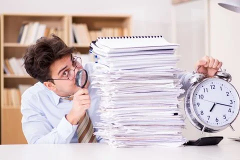 Mad auditor looking for errors in the report Stock Photos