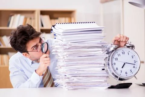 Mad auditor looking for errors in the report 스톡 사진