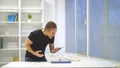 The mad man throws the phone on the table. slow motion 4k or 4k+ Resolution
