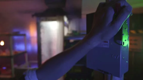 Mad Scientist Turns Off Lab Stock Footage 33849987