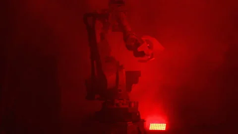 Mad Tech Robot Appearing Out From Twinkling Smoke Stock Footage 103180837