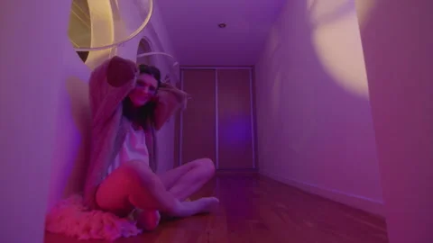 Mad Woman Having Panic Attack in Room with Flashing Neon Light Video stock 255314375