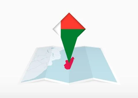 Madagascar is depicted on a folded paper map and pinned location marker wit.. Stock Illustration