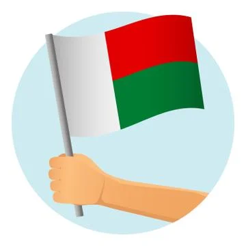 Madagascar flag in hand Stock Illustration