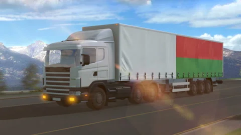 Madagascar flag shown on the side of a large truck Stock Footage 122102831