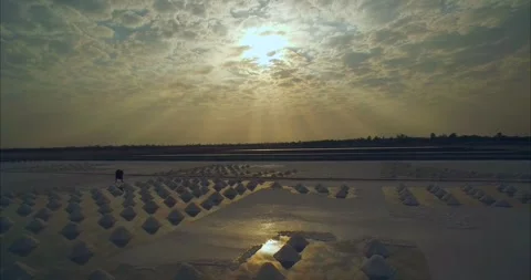 Madagascar Salt Plain Aerial Drone Shot Sunset Timelapse of Harvesting Piles Stockbeeldmateriaal 338263250