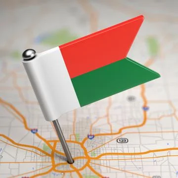 Madagascar Small Flag on a Map Background. Stock Illustration