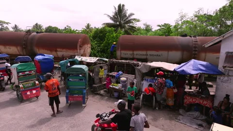 Madagascar train in village Stockbeeldmateriaal 264929744