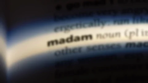 Madam word in a dictionary. Stock Footage 99563157