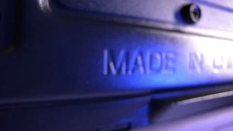 Made in china lettering on a black computer case Stock Footage 141918220
