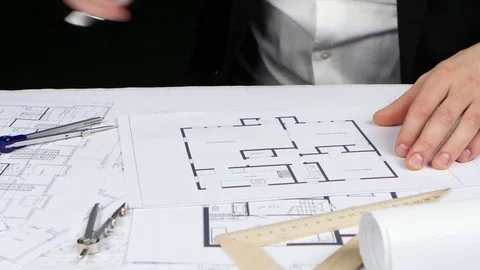 Made engineer corrects errors on the pencil drawing. Close up Stock Footage 73680376