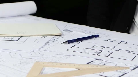 Made engineer corrects errors on the pencil drawing. Close up Stock Footage 73681473
