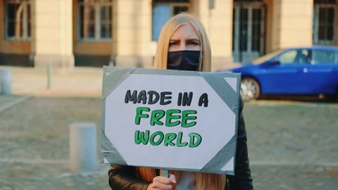 Made in a free world - slogan on protest actions in the city Stock Footage 141623258