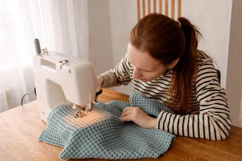 Made by hand from home. sewing machine project quarantine, lockdown. home sewing Stock Photos