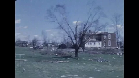 MADISON - 1974: Tornado Aftermath — Bare lawn, lone frame and uprooted tree Stock-Footage 342229992