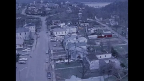 MADISON - 1974: Tornado Aftermath — Bare swath cuts hillside river town Video stock 342230817