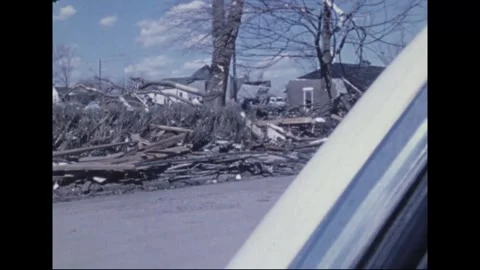 MADISON - 1974: Tornado Aftermath — In-car view passes debris windrows Stock Footage 342230342