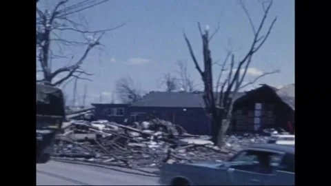 MADISON - 1974: Tornado Aftermath — Crawler crane near collapsed industrial roof Stock Footage 342230036
