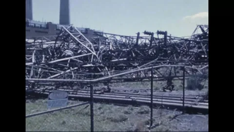MADISON - 1974: Tornado Aftermath — Danger sign fronts downed steelwork Stock Footage 342229847