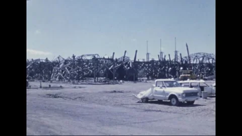 MADISON - 1974: Tornado Aftermath — Dump truck and downed pole structures Stock Footage 342229850