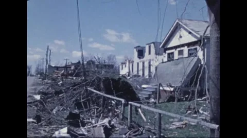 MADISON - 1974: Tornado Aftermath — Slumped porch roof and uprooted root ball Stock Footage 342229927