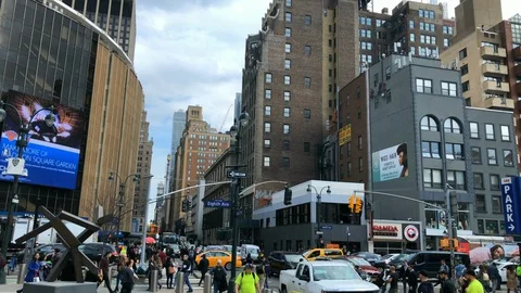 Madison Square Garden.
Motion time laps of people and traffic moving along Video stock 104831132