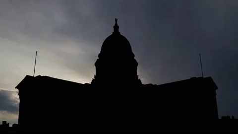 Madison, Time Lapse at Sunrise with Fast Clouds and Dark Silhouette of Capitol Stock Footage 140921285
